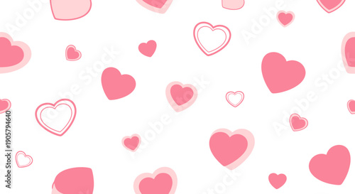 Romantic valentine's day background with various sized pink hearts scattered on a white background