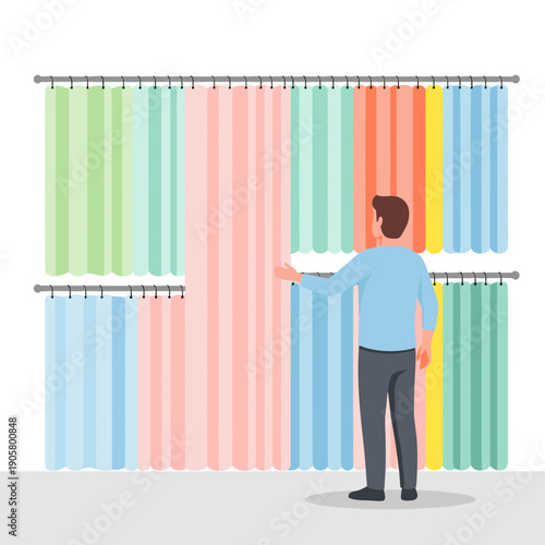 Man choosing colorful curtains in home store interior  