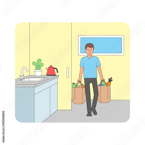 Man carrying grocery bags into kitchen while smiling at home  