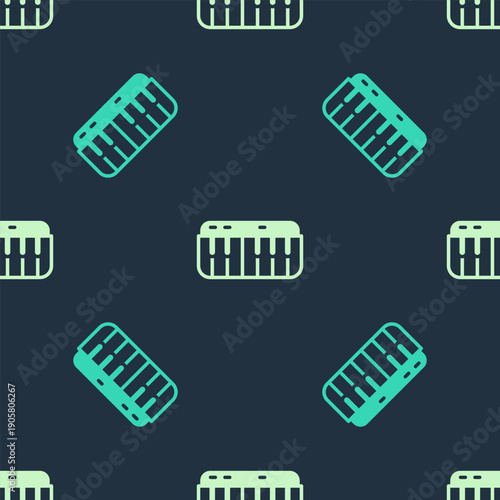 Green and beige Music synthesizer icon isolated seamless pattern on blue background. Electronic piano. Vector