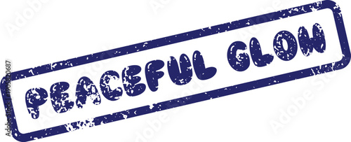 Blue grunge rubber stamp impression with the phrase Peaceful Glow in a distressed rectangular form