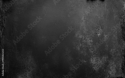  Black grunge cement wall texture for interior design. Painted stone wall with chipped old plaster Art black concrete stone texture for background in black. 