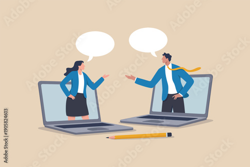 Two professionals engaged in a virtual discussion on their laptops