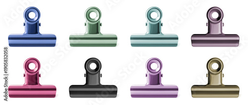 Colorful metal binder clips set on transparent background for stationery, office planning, and scrapbooking projects.