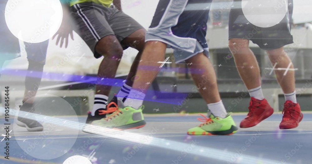 Obraz premium Showing players lower bodies racing on blue court, in sport shorts, crew socks, neon green sneakers
