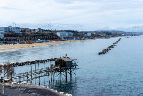 Termoli, seaside gem of Molise, unites a colorful medieval borgo on a rocky promontory, Swabian castle, Romanesque cathedral and wide sandy beaches lapped by the Adriatic.