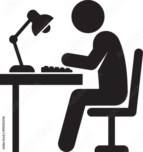 Man working on laptop in office at desk