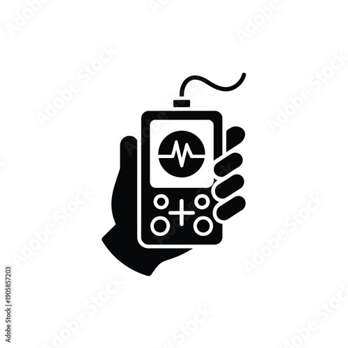 Hand holding a portable ultrasound device with a monitor display