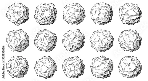 Collection of crumpled paper balls arranged in a grid