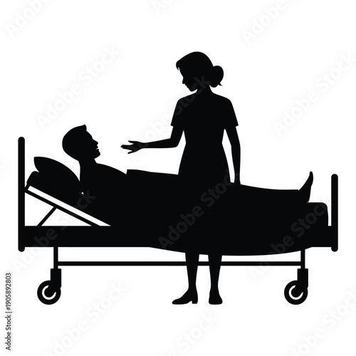 Silhouette of a nurse attending to a patient lying in a hospital bed
