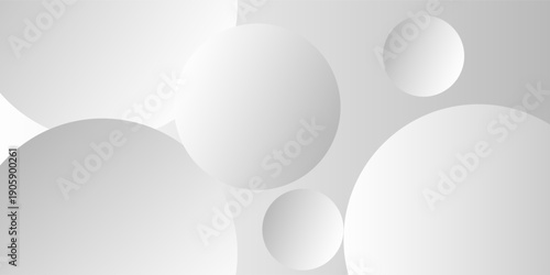 A minimalist abstract background featuring overlapping curves and circular shapes in various shades of gray, creating a smooth gradient and subtle depth