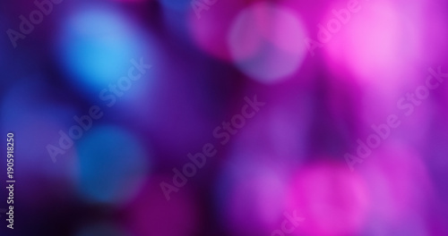 Blur flare light. Neon bokeh background. Defocused blue purple pink color glint round glisten on illuminated art visual abstraction.