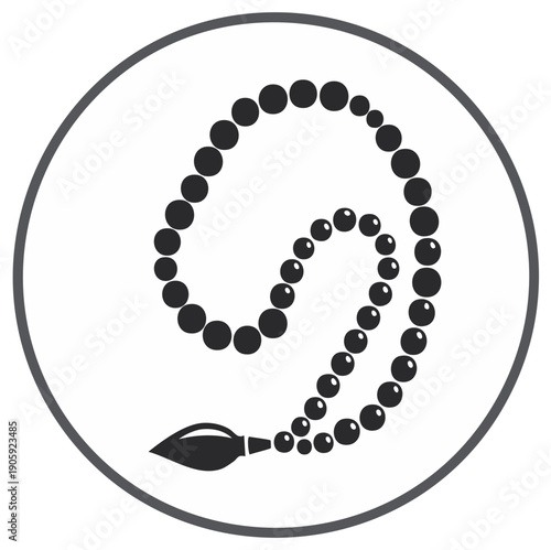 Islamic prayer beads, also known as Tasbih or Mala, made of black pearls, arranged in a circular pattern with a tassel.