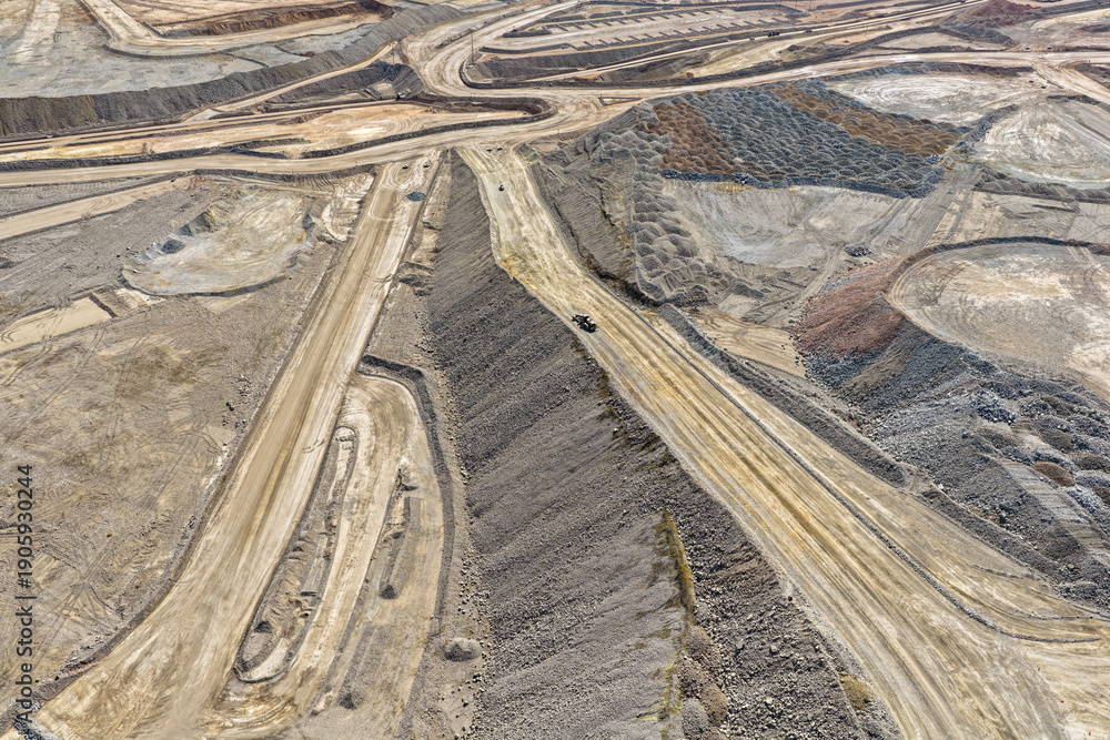 Obraz premium Panoramic view of enormous mining roads for the transport of minerals and mine waste