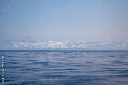 Billede på lærred Atlantic Ocean off the coast of the Azores, still and calm with cloud on the hor