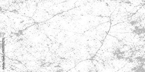 Vintage gray concrete wall with a rough grunge texture and dirty cement surface creates a weathered old paper pattern for a grungy material backdrop