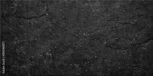 Rough old asphalt texture and grunge concrete wall surface with a dark grey stone pattern for a black and white material background