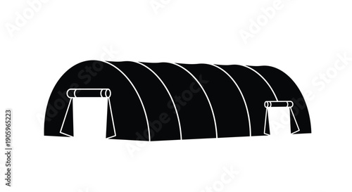 Black silhouette of a quonset hut structure with an entrance silhouette