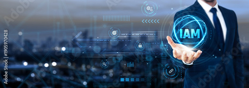 Businessman holding global IAM network and identity management, access control, cybersecurity solutions, authentication systems, secure logins, enterprise protection, user management, digital security