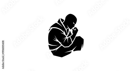 Silhouette of a person in martial arts pose