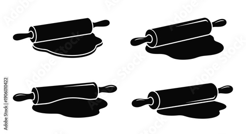 Four rolling pins in black with dramatic shadows silhouette