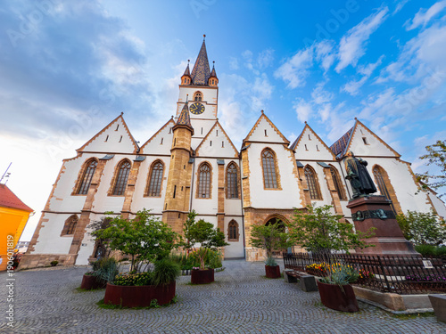Historic cathedral square in Sibiu. Historic cathedral square with statue and church architecture in Sibiu