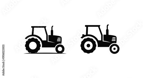 Two black tractor silhouettes against a white background silhouette