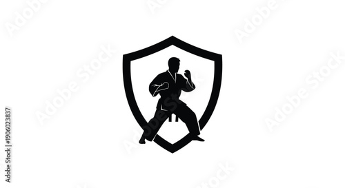 Martial artist in shield shape dynamic pose black silhouette