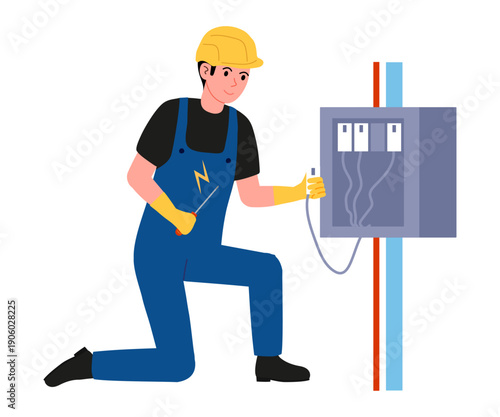 Electrician at work. Specialist on one knee and repairing electrical wiring in electrical panel. Man in overalls, gloves, helmet