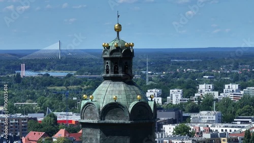 Cinematic 360-Degree Orbit of Historic Church Tower and Wrocław Cityscape