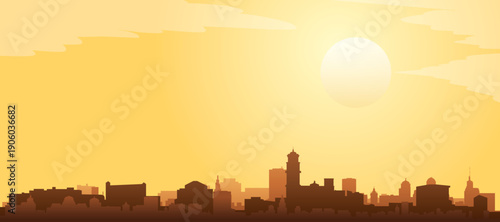 Golden yellow panoramic poster of the city skyline with misty background buildings and clouds of PUEBLA, MEXICO