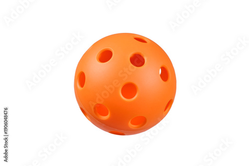 Orange plastic pickleball isolated in PNG on transparent background