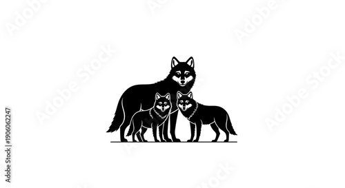 Black silhouette of a wolf and her two cubs standing together.