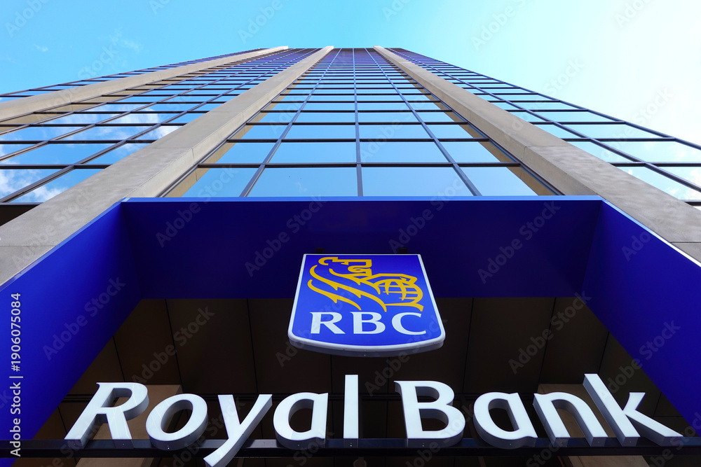 Fototapeta premium TORONTO - OCT 11: Sign of RBC (Royal Bank of Canada) at branch office in Toronto on Oct 11 2025. RBC is a Canadian multinational financial services company. 