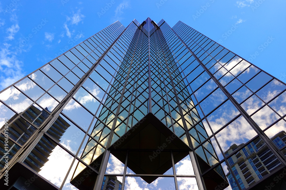 Fototapeta premium TORONTO - OCT 11: Sign of RBC (Royal Bank of Canada) at branch office in Toronto on Oct 11 2025. RBC is a Canadian multinational financial services company. 