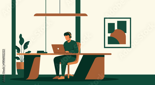 Man working on laptop at modern office desk.