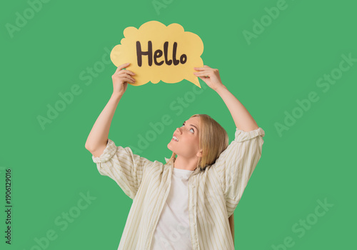 Young woman holding speech ...
