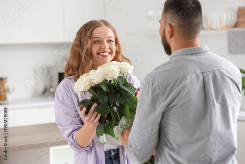 Young woman receiving white...
