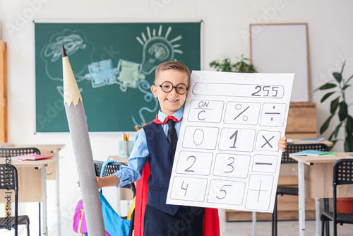 Cute little schoolboy with ...