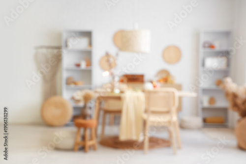 Quadro su tela Blurred view of stylish dining room with table, shelf units and autumn decor