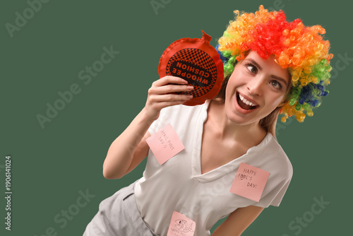 Businesswoman in clown wig ...