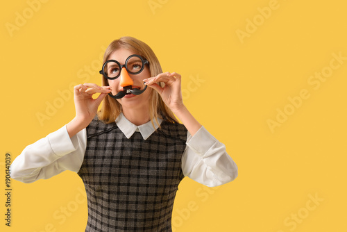 Young businesswoman in funn...