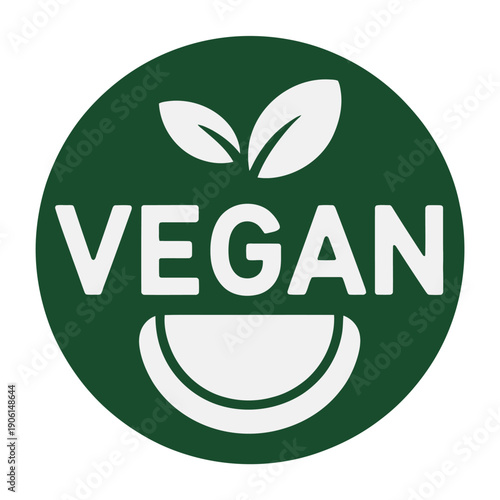 Vegan logo with green circle and white text, symbolizing plant-based lifestyle and eco-friendliness naturally