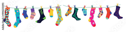 socks on a rope with colored clothespins dry the sock and