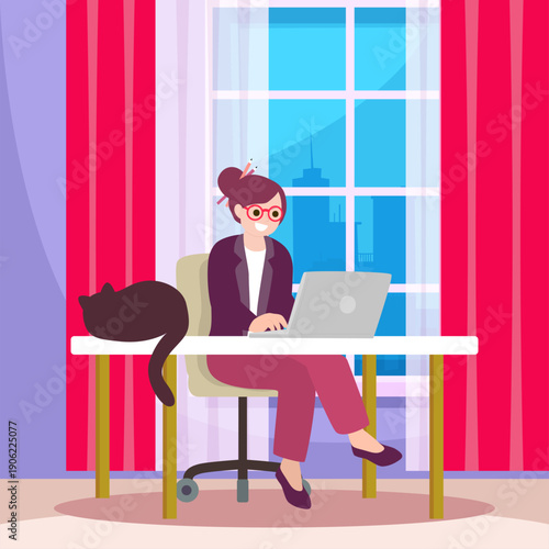 Freelance designer working from home with pet cat on desk