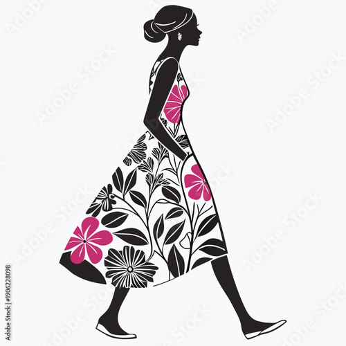 A stylish woman in a floral dress walking with elegance and poise