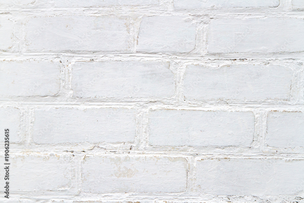 Obraz premium Texture of white vintage brickwork. Whitewashed brick wall close-up