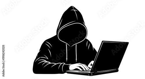 Anonymous hacker in black hoodie with obscured face typing on a laptop computer representing cybercrime data breach and digital