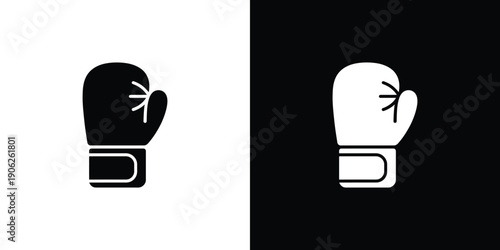 Black and white boxing gloves on split background sports equipment