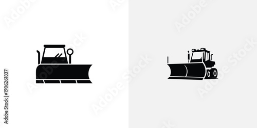 Black and white bulldozer and snowplow construction
